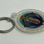 Llavero marcador de maletas con el escudo de la Asociación Virgen del Carmen de los Submarinistas Malagueños